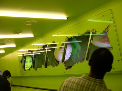 Video projection on fibreglass by Tony Oursler, 2004. Escalator between Levels 3 & 5, Seattle Central Library. Photo courtesy of The Seattle Central Library.