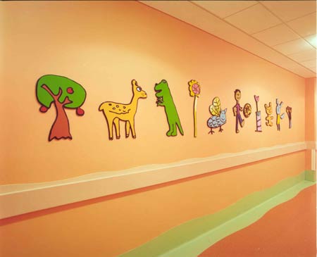 Lacquered cut-outs, crash barrier and skirting designs by Ray Smith, 2001. Bristol Royal Hospital for Children.  Photo: Jerry Hardman-Jones.