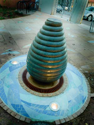 Sculpture in courtyard by Mat Chivers, 2004.  Wellspring Healthy Living Centre, Barton Hill, Bristol.