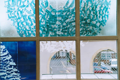 Detail of window in foyer by Anne Smyth, 2004. Wellspring Healthy Living Centre, Barton Hill, Bristol.