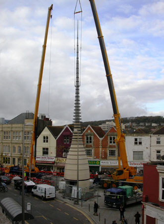 The spire being lowered into place, November 2006; photograph: Mark Luck, North Somerset Council.