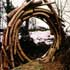 Link to larger image: Entrance, sculpture in wood by Andy Goldsworthy, 1986.Hooke Park Wood, near Beaminster, Dorset.Photo © Common Ground.