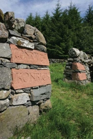 Andy Goldsworthy, carved names in dyke at Byre entrance, part of Striding Arches, Cairnhead, Scotland. Photo: Mike Bolam