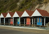 The site today - blue portacabin and 5 beach huts